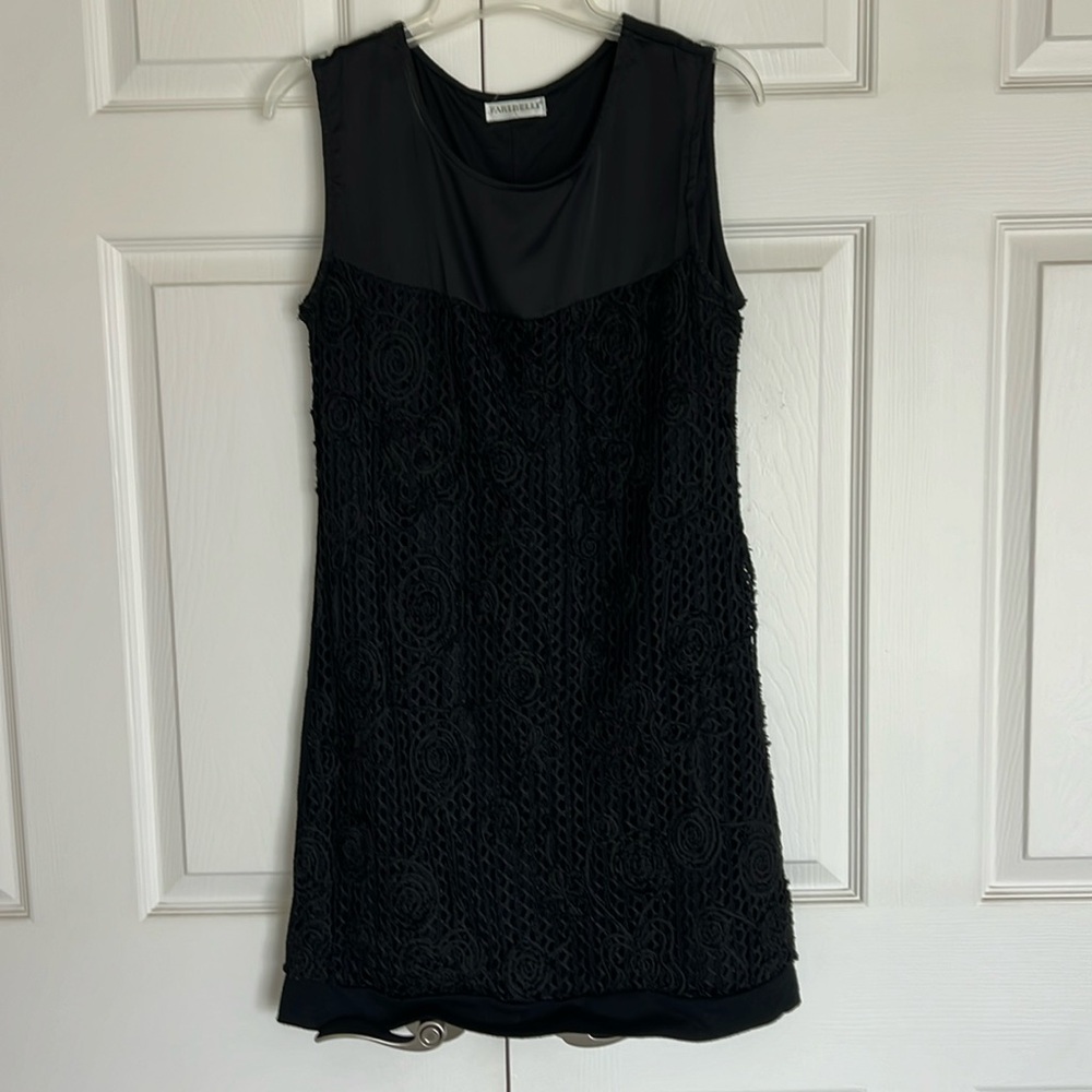 Small lined black dress with lace body.